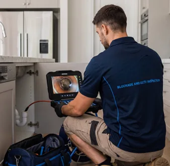 Clearing a blocked sink at a Roseville property